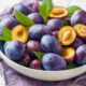 A bowl filled with fresh plums, showcasing the vibrant colors and highlighting the plum benefits for health